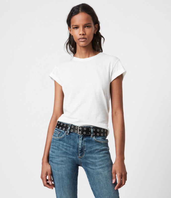 A WOMAN WEARING WHITE T SHIRT AND JEANS