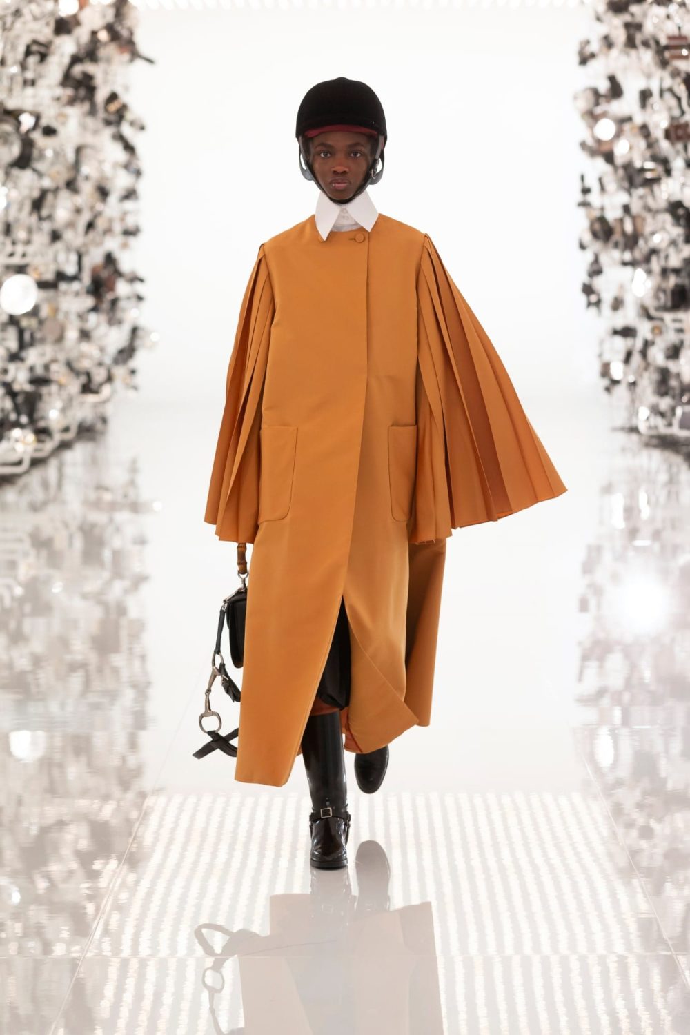 gucci model in orange outfit